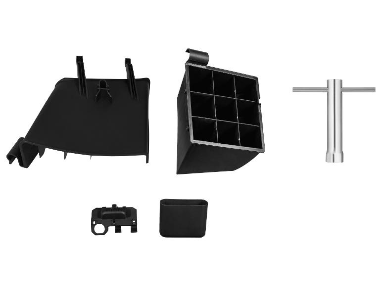 Zwarte plastic onderdelen en een metalen sleutel op een witte achtergrond.