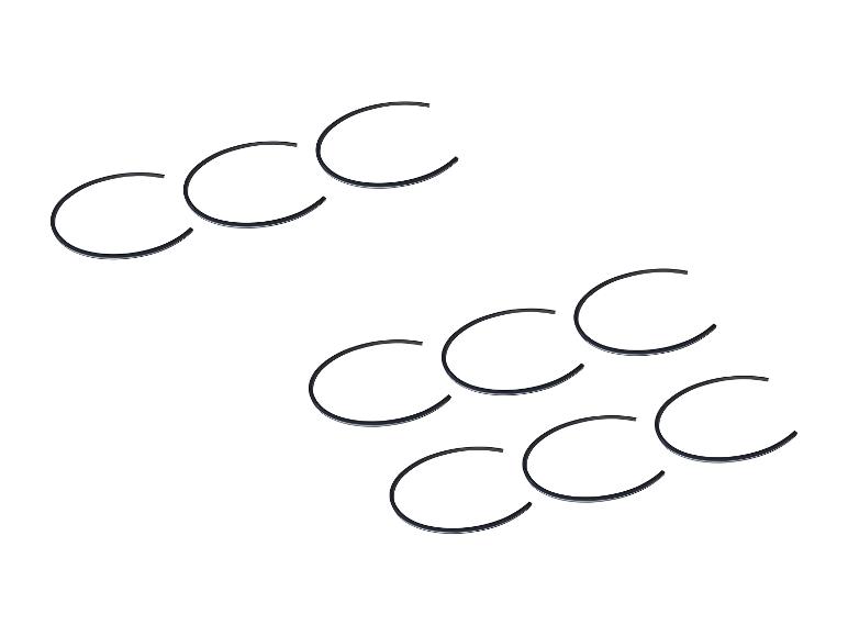 Meerdere zwarte rubberen afdichtingen in groepen op een witte achtergrond