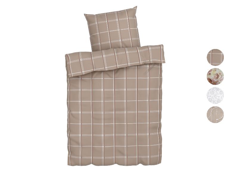 Dekbedovertrek en kussensloop met een beige en wit ruitpatroon.