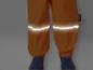 Oranje regenbroek met reflecterende strepen en 3M Scotchlite-materiaal.