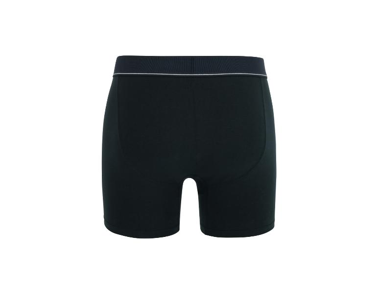 Donkere herenboxershort met elastische tailleband en witte streep, achteraanzicht.