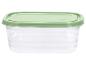 Transparante plastic voedselcontainer met groene deksel