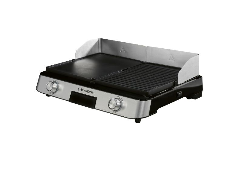 Tafelmodel elektrische grill met gladde en geribbelde platen, en temperatuurregelaars.