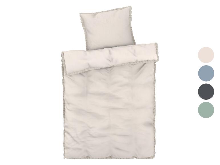 Beige beddengoedset met ruches.