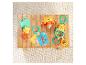 Winnie de Poeh-thema babyrammelaars en flashcards op een houten tafel.