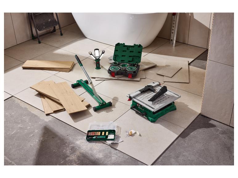 Gereedschap voor het leggen van tegels en vloeren, inclusief tegelsnijder, tegelzaag en reparatieset.
