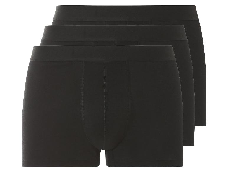 Drie zwarte boxershorts.