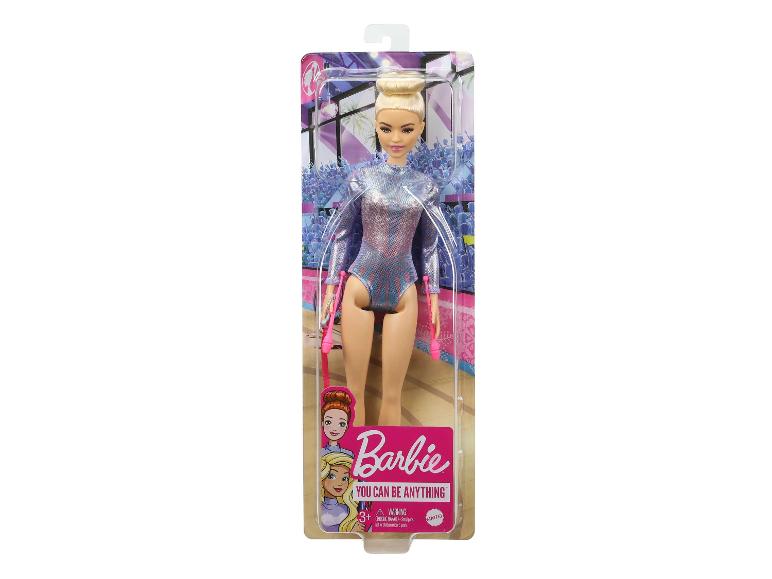Barbie pop met turnpak en accessoires.