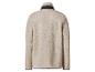 Beige teddyfleece jas met zwarte kraag en manchetten.