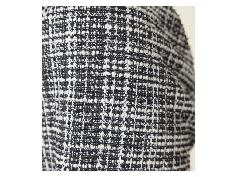 Close-up van een zwarte en witte geruite stof.