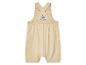 Beige romper met brede schouderbandjes voor baby's.
