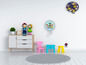 Paw Patrol lampen met een kinderstoel en een dressoir in een kinderkamer.