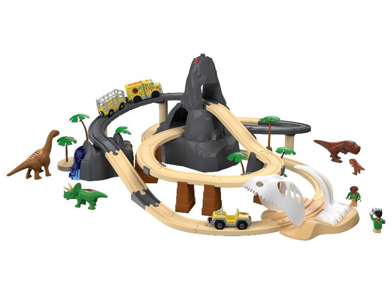 Dinosaurus treinbaan met vulkaan, dinosaurussen en voertuigen.