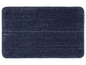 Een donkerblauwe badmat met een ruwe textuur.