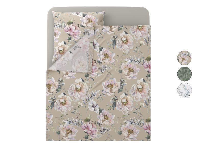 Dekbedovertrekset met bloemenpatroon in beige, roze en groene tinten.
