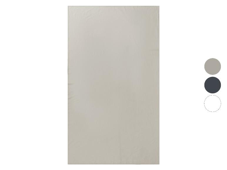 Eenvoudig effen vlakke lakens in beige, donkergrijs en wit.