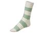 Witte sokken met groene strepen.