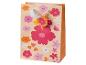 Cadeautas met kleurrijke bloemenprint en wit linten handvat.