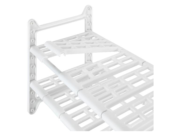 Witte, twee-laags schoenenrek, stevige plastic constructie.