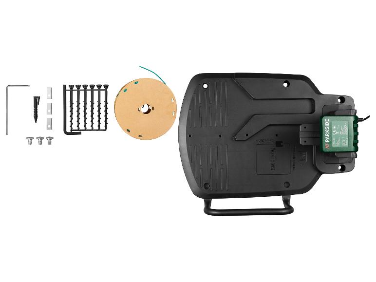 Accessoires voor robotmaaier, inclusief begrenzingskabel, haringen en oplader.