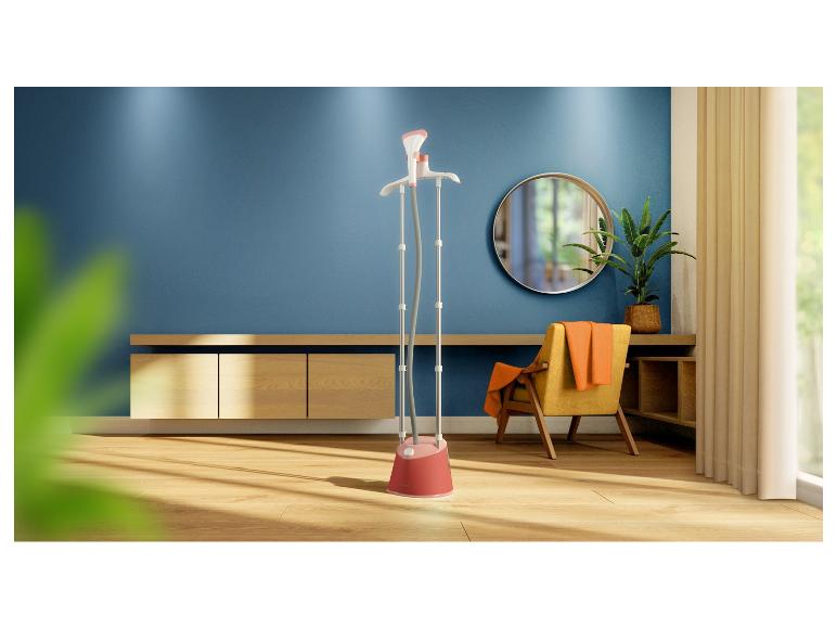 Een roze stoomstrijkijzer in een moderne woonkamer.