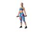Vrouw in sportkleding met dumbbells.
