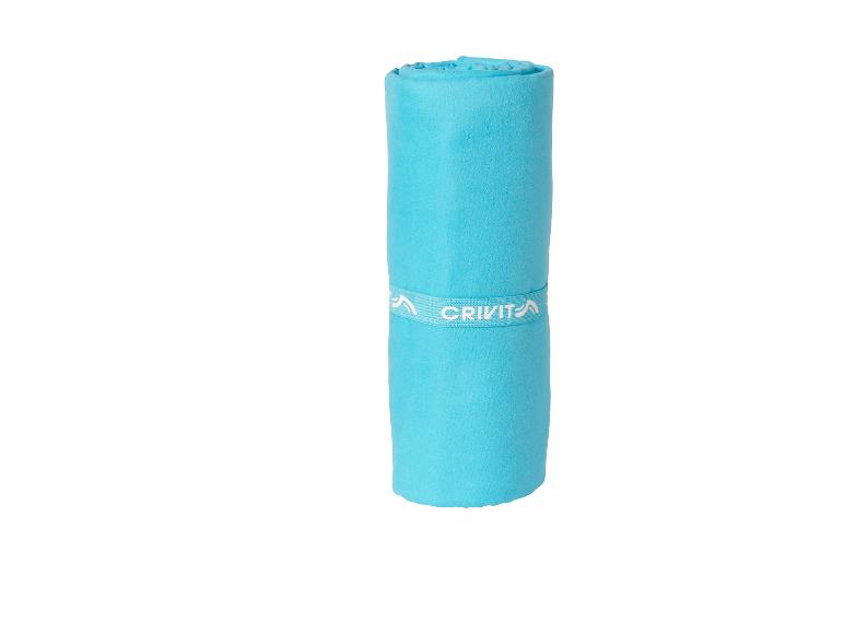 Opgerolde, turquoise Crivit sport handdoek.