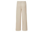 Beige broek met wijde pijpen.