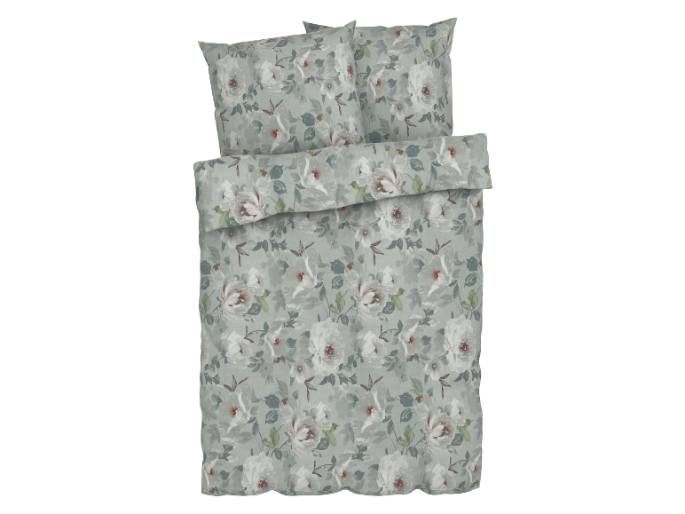Beddengoed met een bloemenprint in groene en witte tinten.