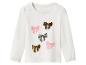 Wit longsleeve shirt voor meisjes, versierd met pailletten strikjes.