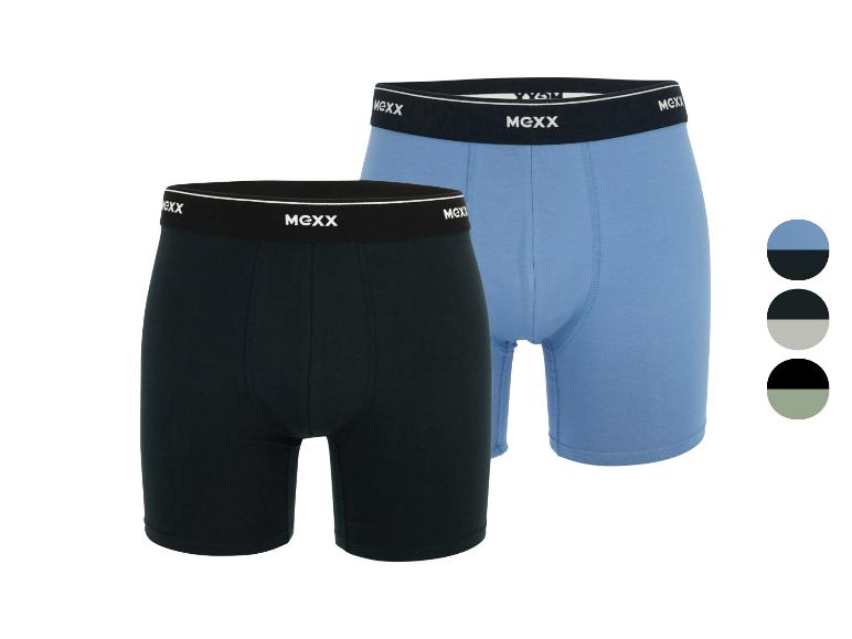 Twee paar herenboxershorts in zwart en blauw, met elastische taillebanden.