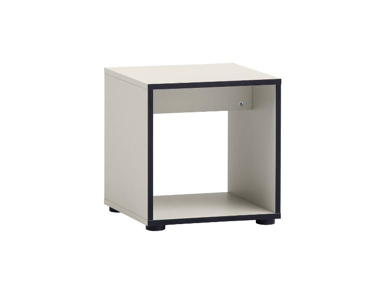 Kleine beige kubusplank met zwarte randen en pootjes.