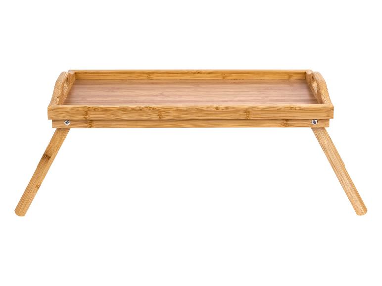 Een bamboe ontbijtblad met opklapbare poten.
