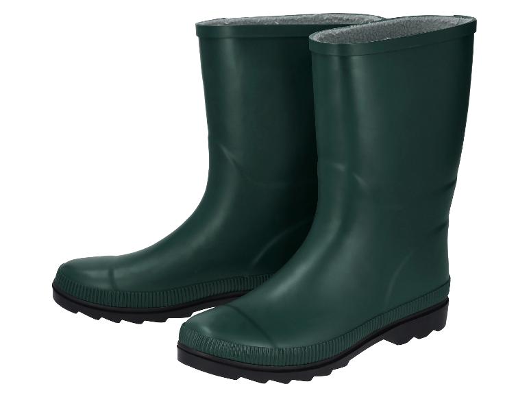 Een paar groene regenlaarzen met een binnenvoering van imitatiebont.