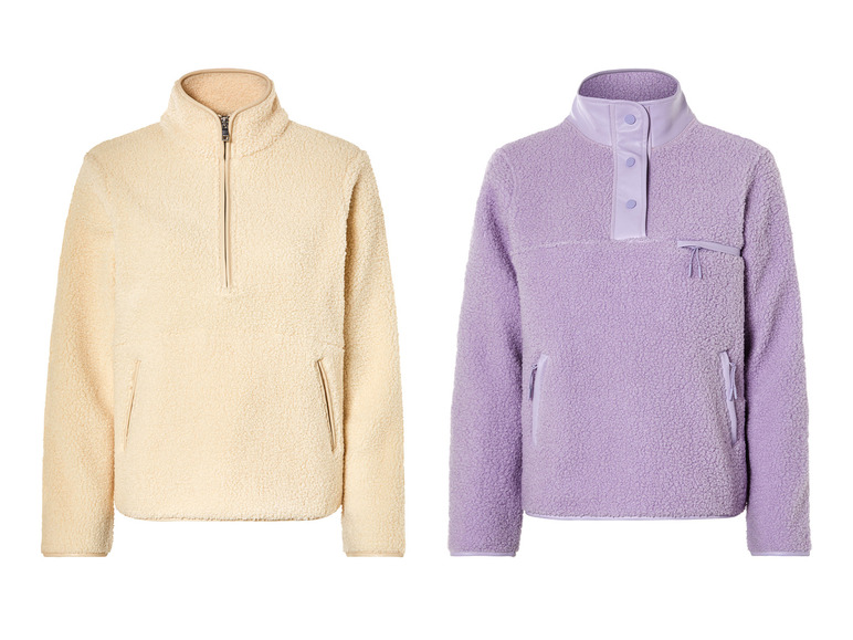 Twee fleece truien, een crèmekleurige met rits en een paarse met knopen.