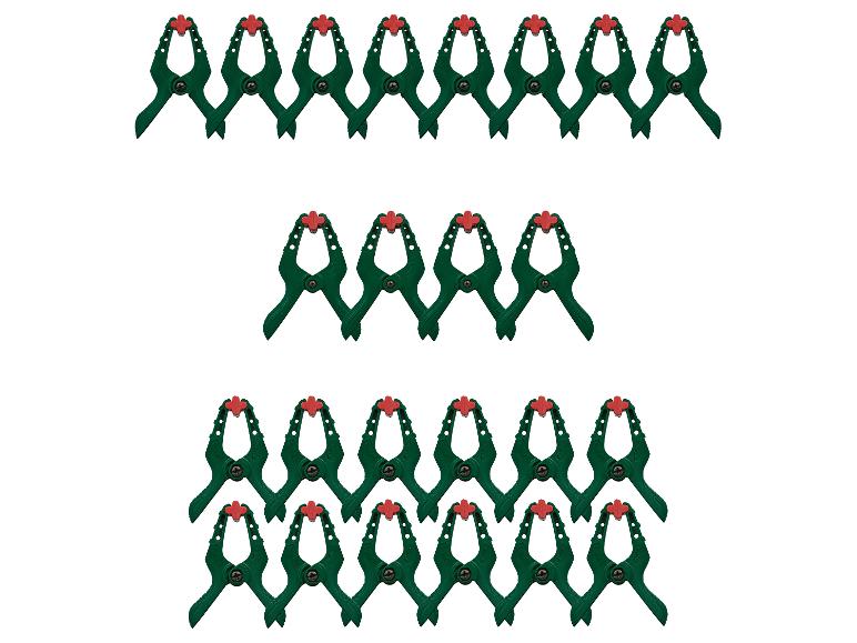 Groene veerklemmen met rode uiteinden, gerangschikt in drie rijen op een witte achtergrond.