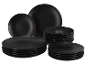Een set zwarte borden en kommen, gestapeld.
