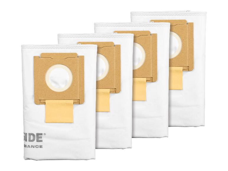 Vier witte stofzuigerzakken van het merk 'Vaxide'.