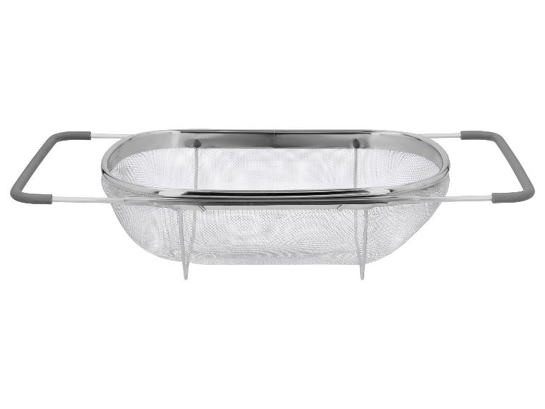 Uitschuifbare keukenvergiet van metaalgaas met grijze handvatten