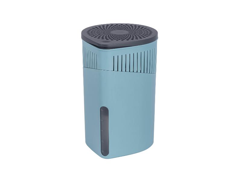 Een draagbare luchtontvochtiger in turquoise.