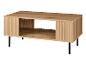 Houten salontafel met geribbelde deuren en zwarte poten.
