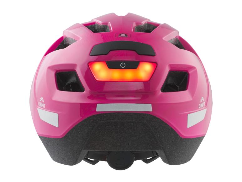 Roze fietshelm met achterlicht en reflecterende details