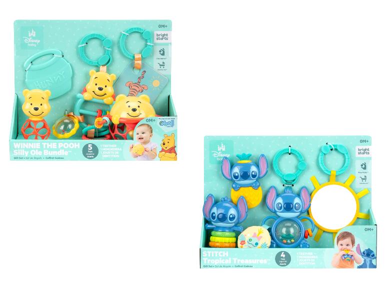 Twee babycadeausets, één met Winnie de Poeh speelgoed en de andere met Stitch speelgoed.