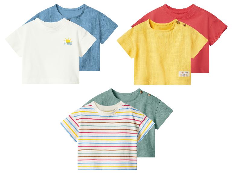 Baby T-shirts met korte mouwen in blauw, wit met zon, geel met 'HAPPY DAY!', rood, groen en strepen.