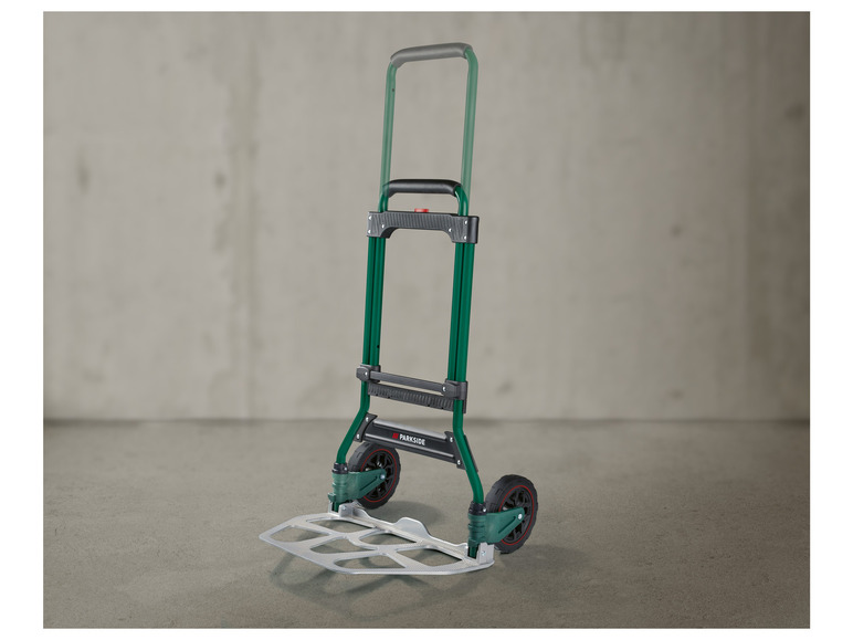 Een groene Parkside handkar met een metalen platform.