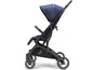 Een blauwe Bugaboo Cameleon 3 kinderwagen.