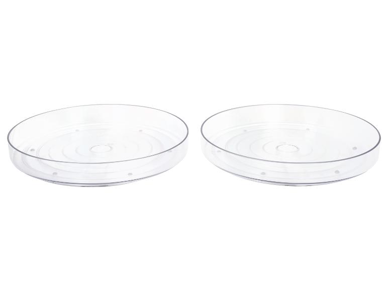 Twee transparante, ronde opbergbakken.