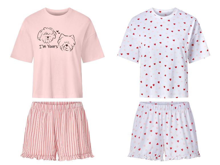 Dames zomerpyjama's: roze met honden en wit met hartjes.