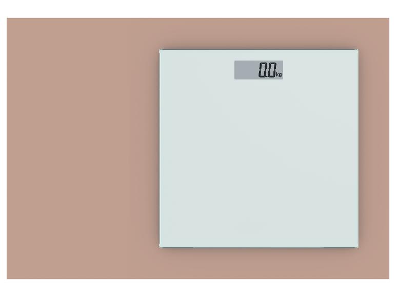 Digitale personenweegschaal met een display van 0,0 kg op een lichtroze achtergrond.