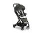 Hauck kinderwagen in kaki met grijze bekleding en zwart frame.
